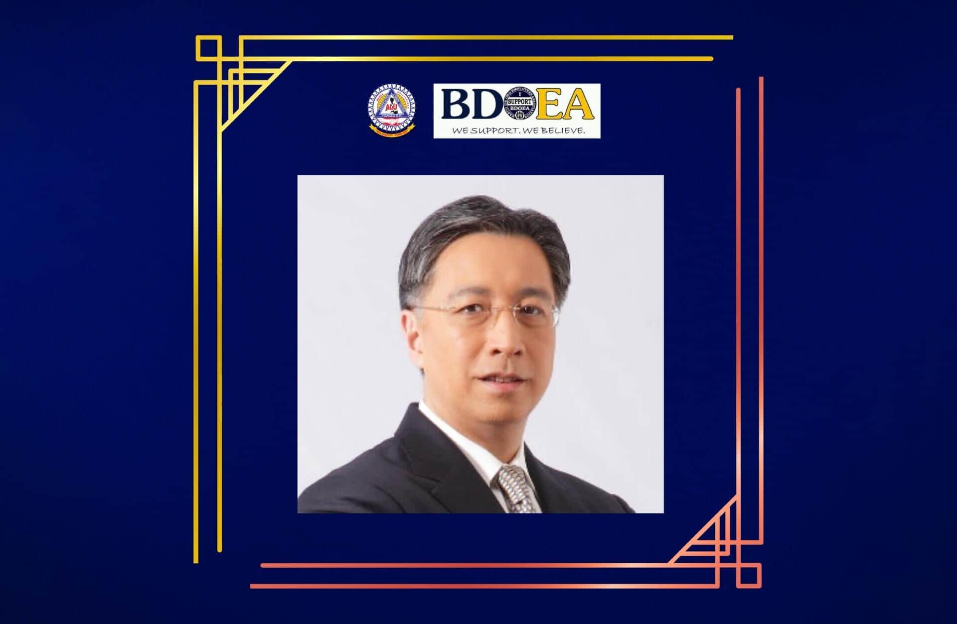Mr. Nestor V. Tan portrait with organization logos, set on a dark blue background with decorative gold and red lines.